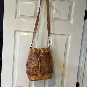 Snake skin bucket bag